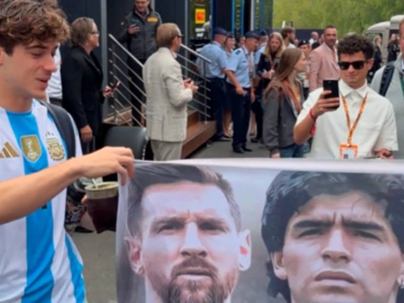 Con una bandera de Messi y Maradona, Colapinto ya empezó a jugar la final desde el paddock de la Fórmula 1